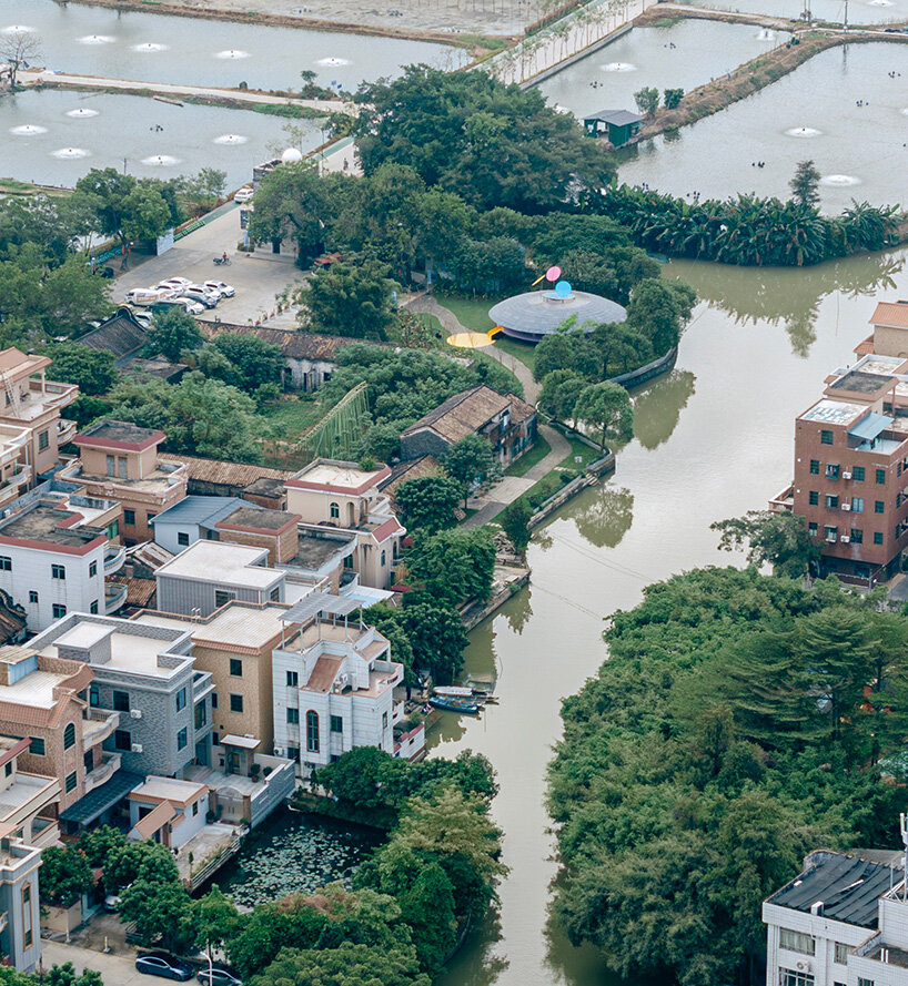 MAD architects honors childhood with flying saucer-like installation at chinese art festival