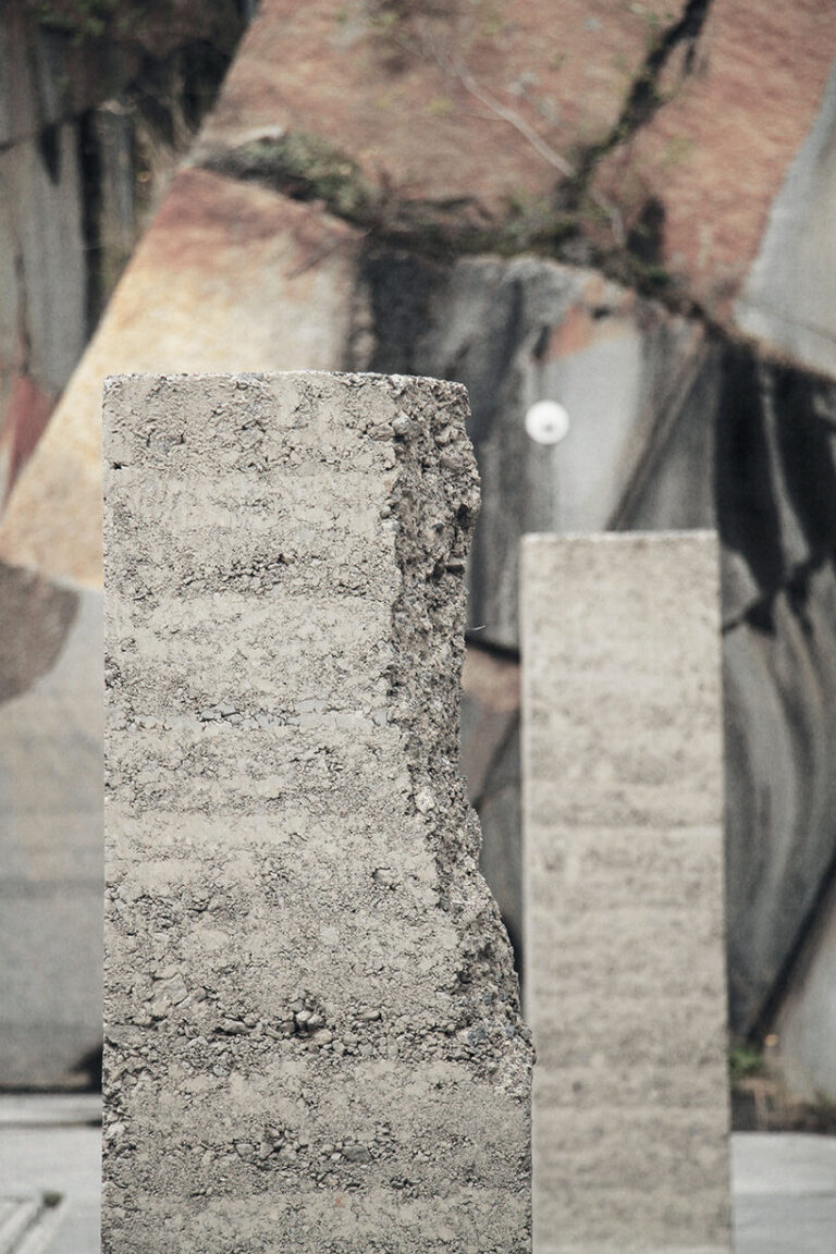 nature sculpts rammed earth installation in norwegian quarry