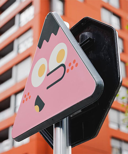 playful characters pop out of wood campers' customized traffic signs in rennes, france