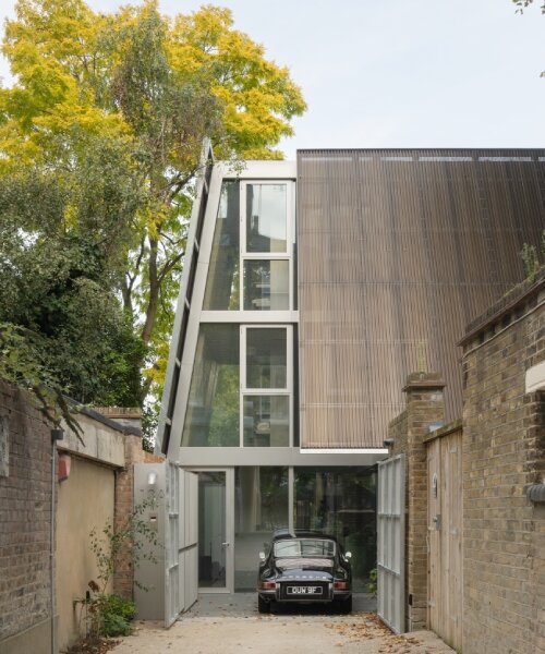 gianni botsford revitalizes london cottage, echoing its industrial norman foster extension