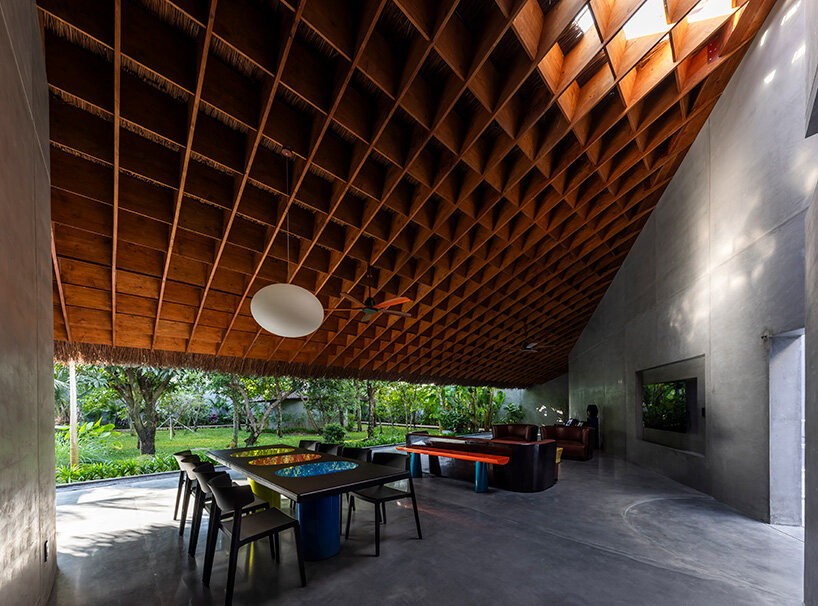 timber waffle roof shields constellation of living spaces in vietnamese residence by kientruc o