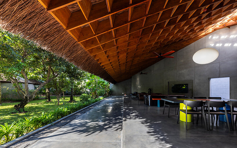 timber waffle roof shields constellation of living spaces in vietnamese residence by kientruc o