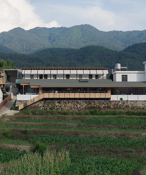 wooden frames by CLAB architects interlock with historic ruins in chinese community center