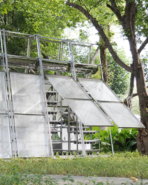 greenhouse and outdoor kitchen pavilion in china bridges the body and land through food