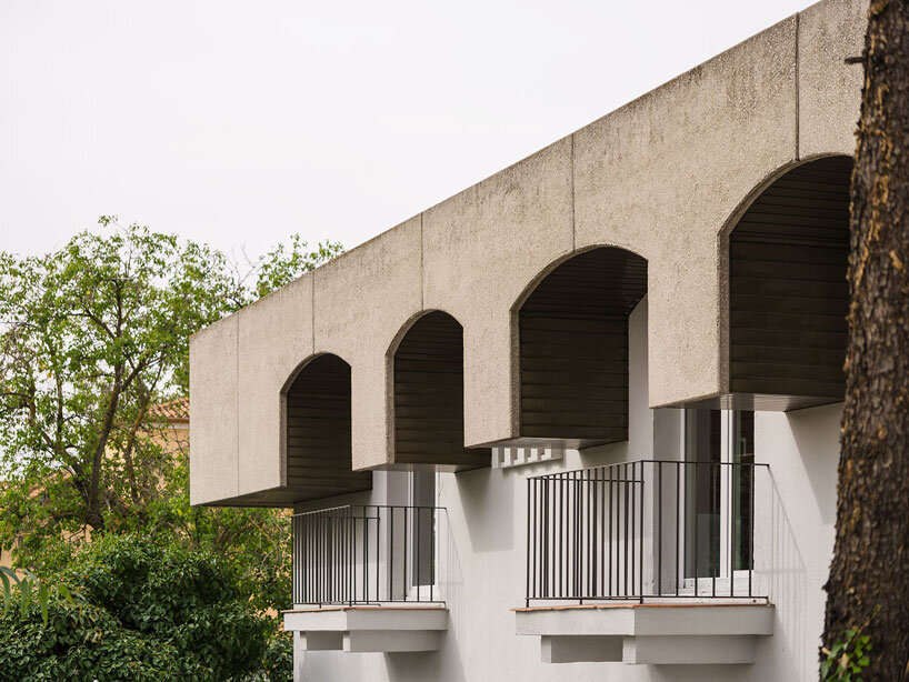 mome.estudio's zen housing units repurpose residential building on madrid's outskirts