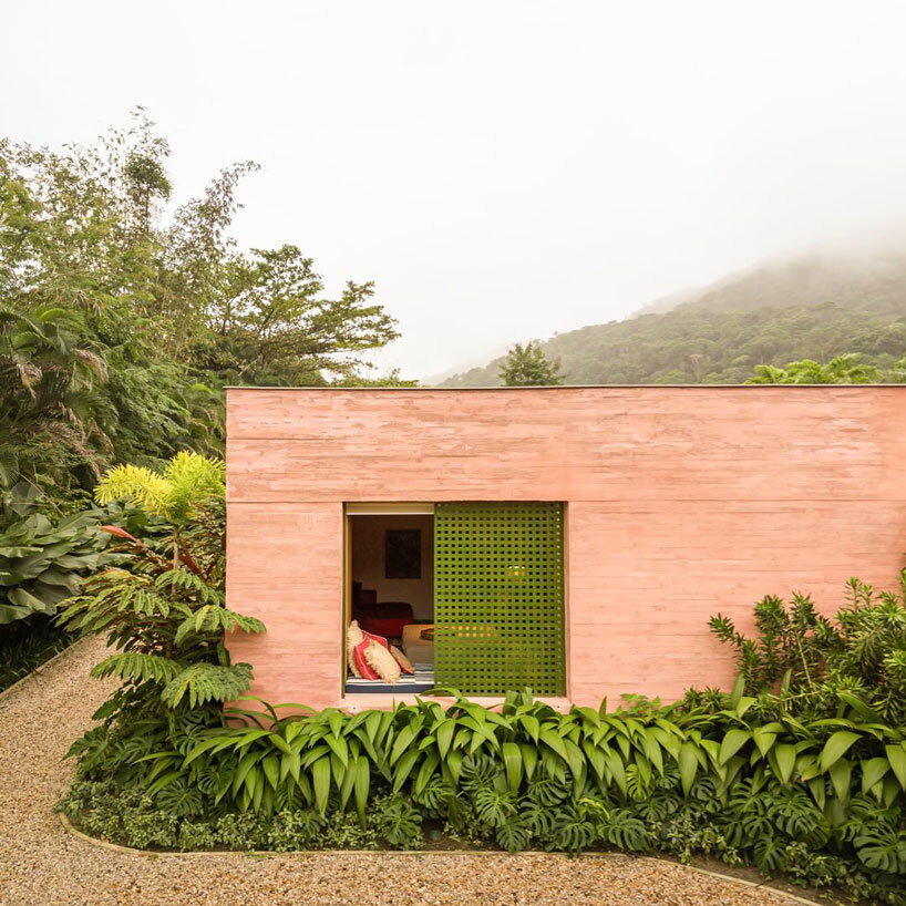 MF+Arquitettos' dry pink concrete residence emerges from Rio de Janeiro's lush jungle