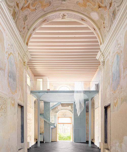 light blue steel structure by caarpa transforms historic italian church into event hall