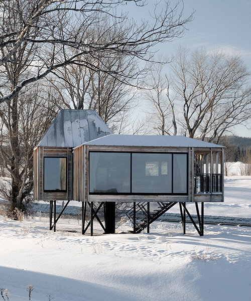 modular residence by delordinaire balances on stilts to preserve natural terrain in quebec