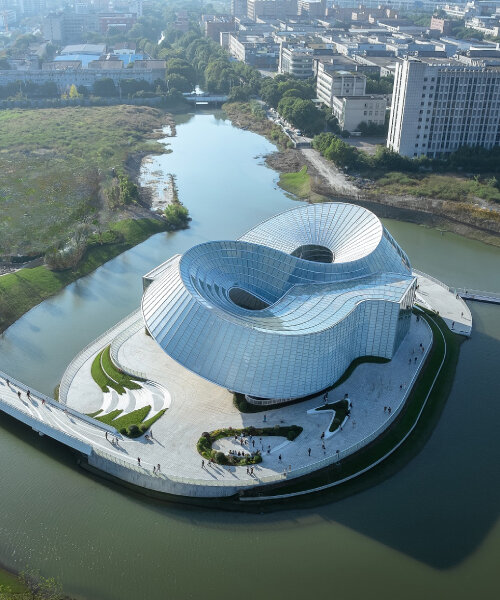 translucent interlocked rings shape aedas' jade-like yohoo museum in china