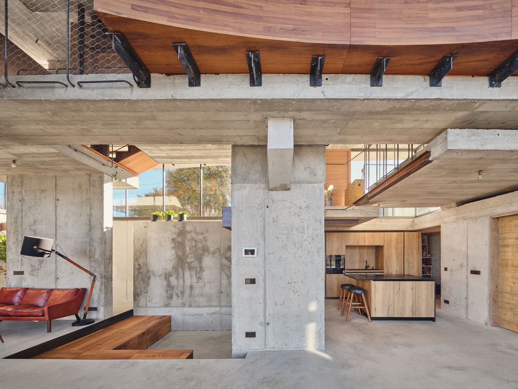 concrete-skin-casa-roble-continuous-curved-facade-madrid-terrain-muka-arquitectura-designboom-1800-3