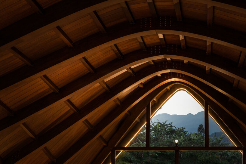undulating wood and bamboo top k-thengono's wedding compound in indonesia countryside 