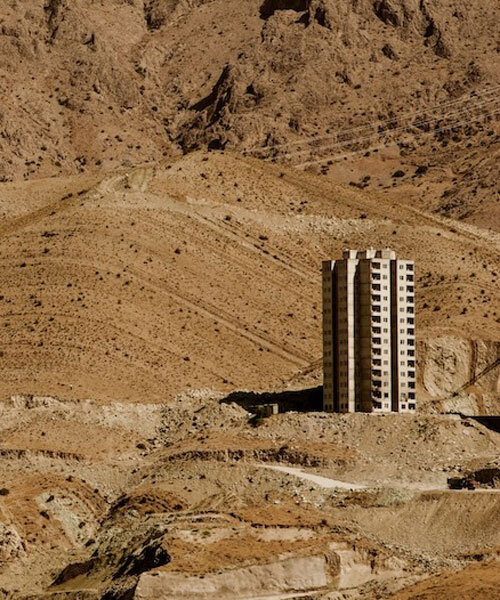 architecture contrasts against arid rock formations in manuel álvarez diestro's photo series