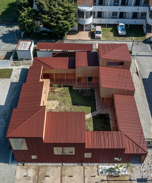 1110 office designs 'necklace house' like a string of beads around a garden in japan