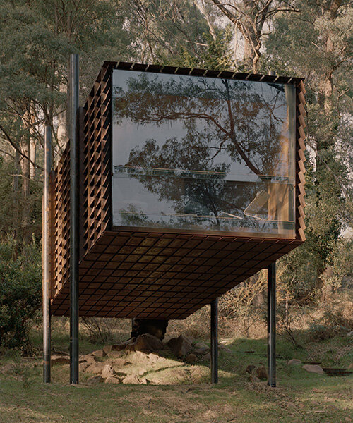 slatted steel panels filter sunlight into robbie walker's sawmill treehouse in australia