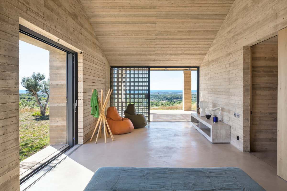 mineral textures & bioclimatic design shape gaëtan le penhuel and associates' house in sicily