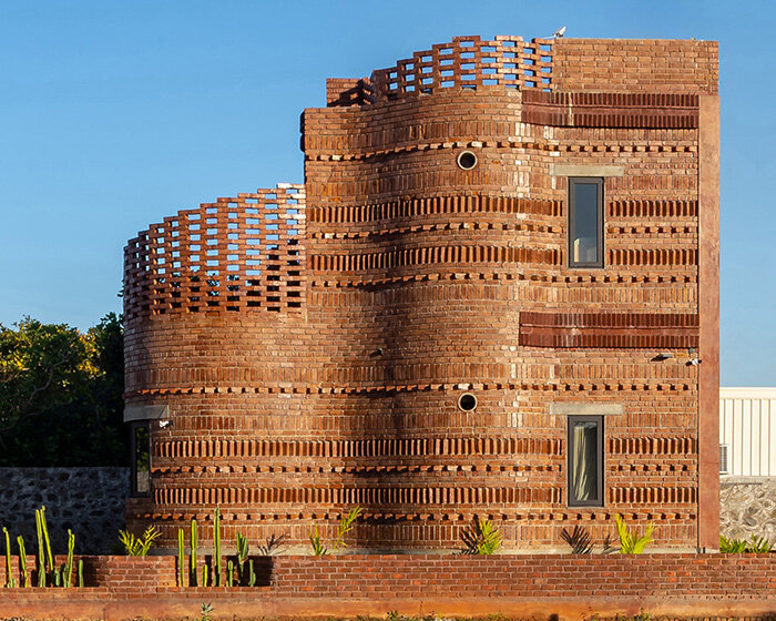 flowing brick guest house by art & architecture spirals like a cactus under the indian sun