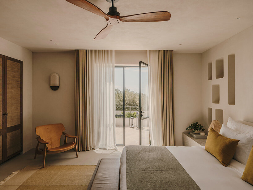 k-studio transforms traditional ibizan finca with flowing spaces and sculptural details
