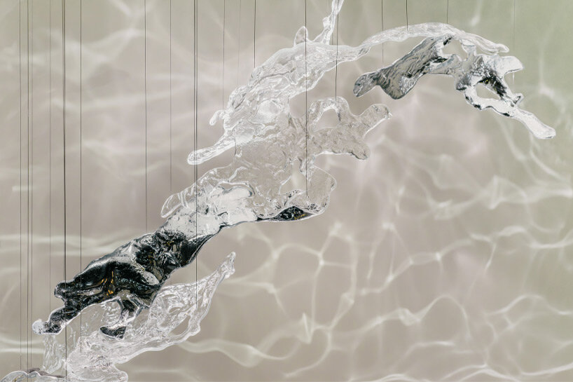 lasvit’s glass & light installation helps recharge energy amidst the rush of milan design week