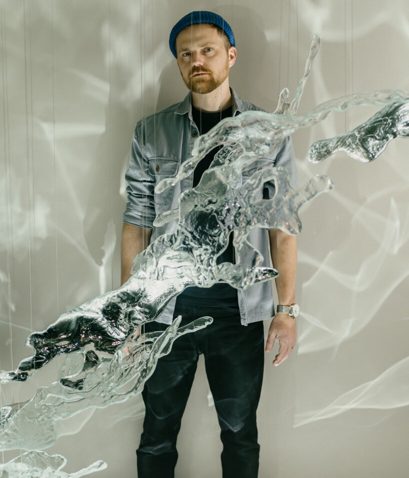 lasvit’s glass & light installation helps recharge energy amidst the rush of milan design week