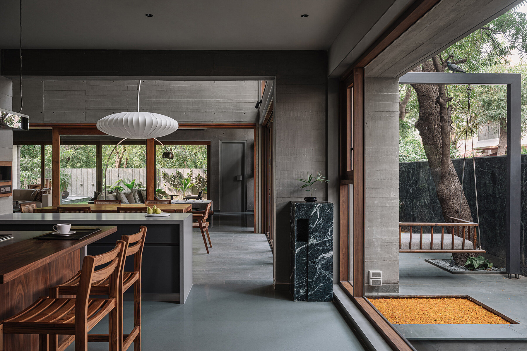 square-openings-wood-textured-concrete-facade-studio-saransh-house-india-designboom-large01