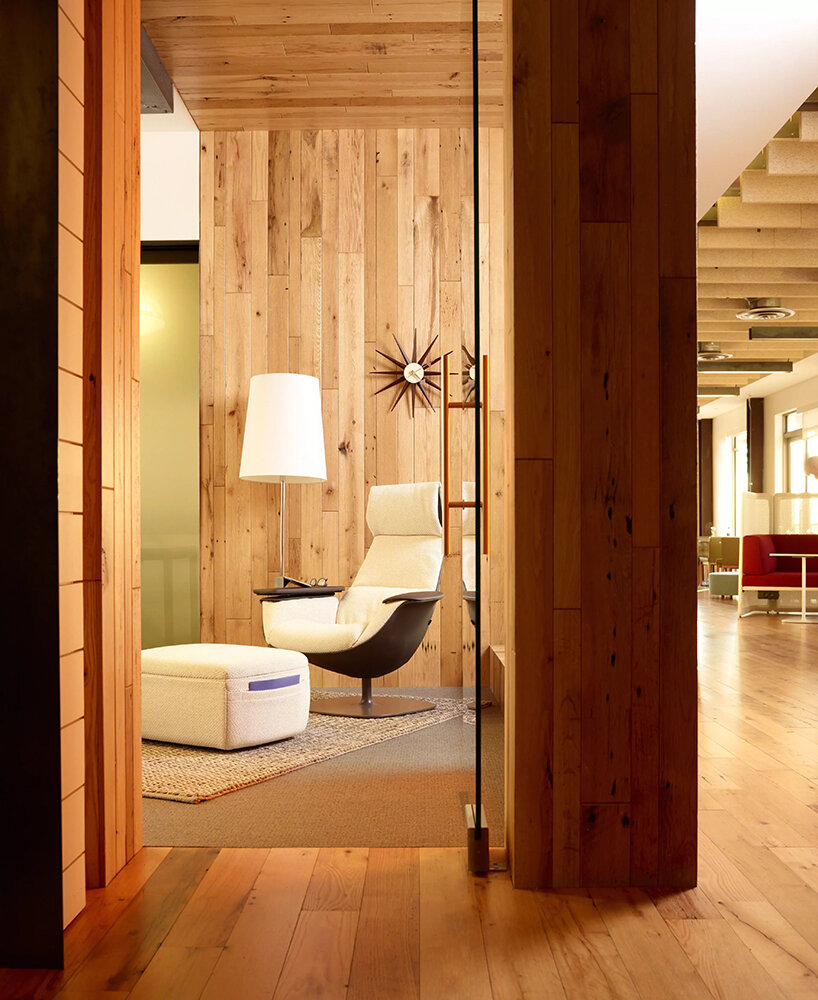 steelcase foresees future of work with cord pass-through & swivel tablet of massaud lounge