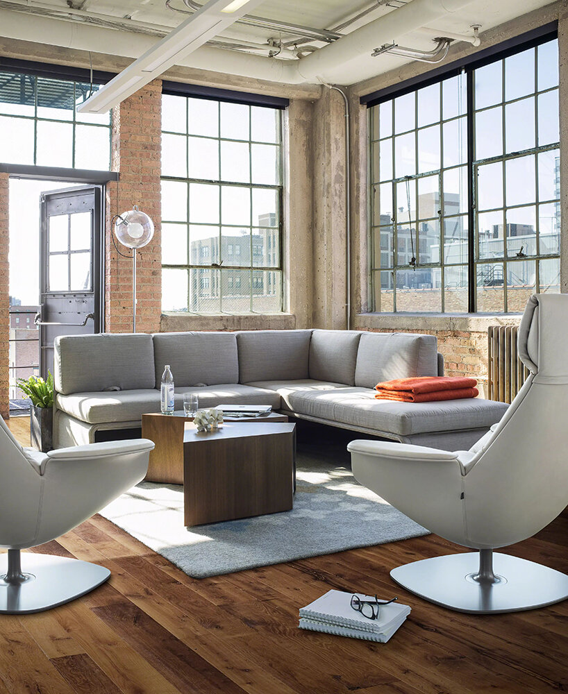 steelcase foresees future of work with cord pass-through & swivel tablet of massaud lounge