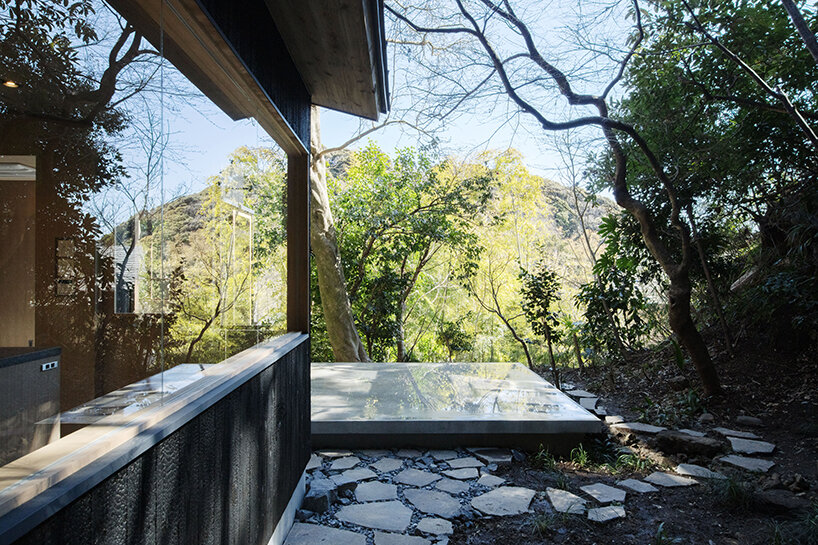 wooden atelier rises from preserved framework of 90-year-old japanese home