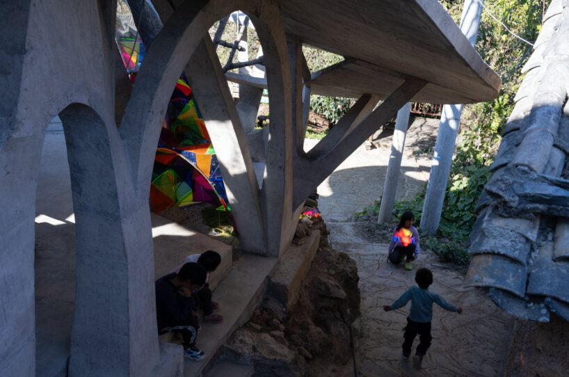 xong xiangwei studio's concrete mushroom library creates reading space for children in china