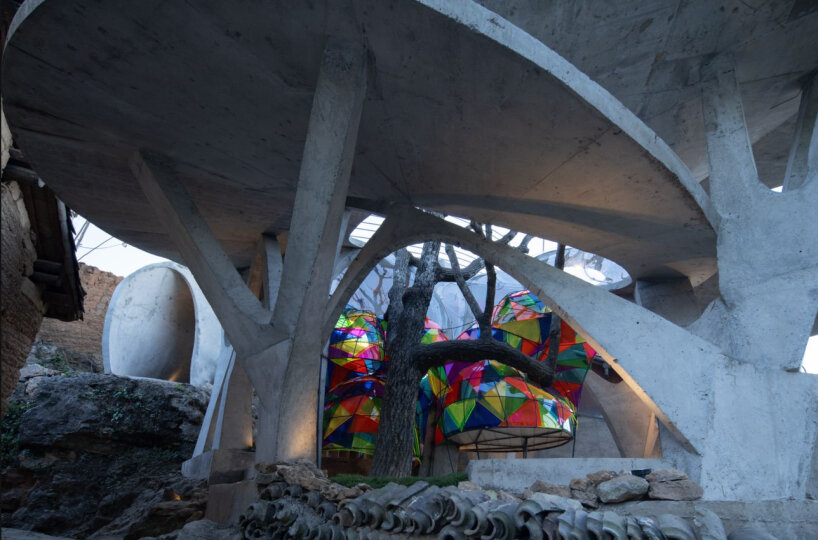 xong xiangwei studio's concrete mushroom library creates reading space for children in china
