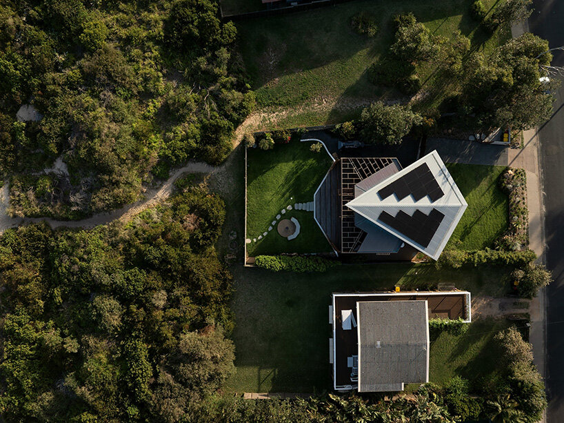 alexander symes revamps kite-like house in australia with solar power and recycled materials