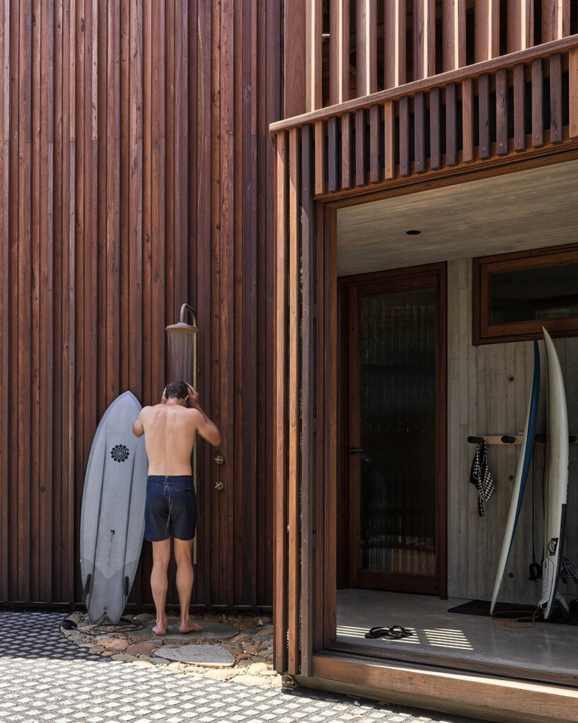 alexander symes revamps kite-like house in australia with solar power and recycled materials