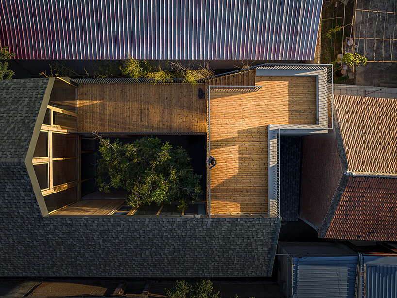 archstudio revives courtyard tradition with timber-framed