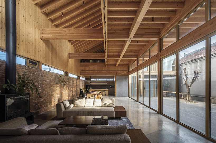 archstudio revives courtyard tradition with timber-framed guesthouse in beijing