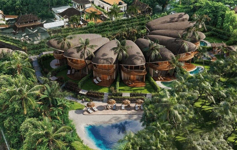 boutique hotel in bali by archigods opens like a blooming ring of pistachio shells
