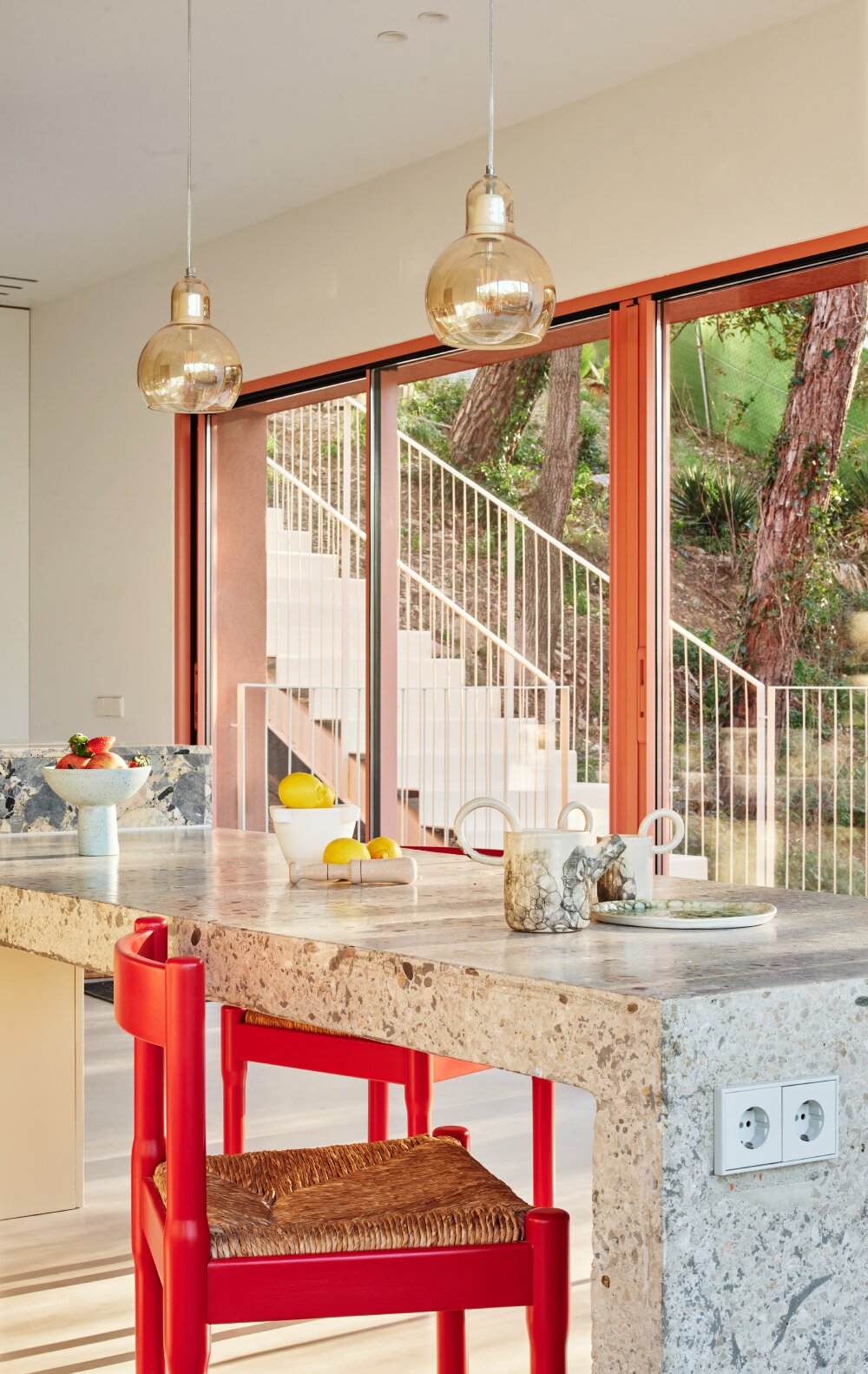 raúl sánchez's casa magarola rests above steep, sloping terrain in spain