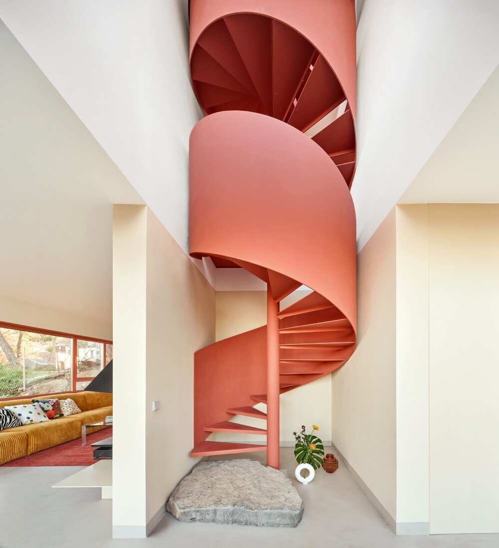 raúl sánchez's casa magarola rests above steep, sloping terrain in spain