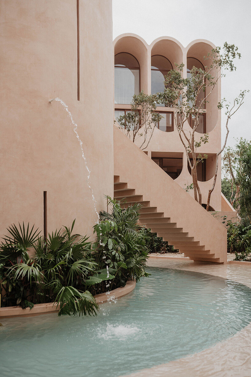 central tower rises from elliptical courtyard in V taller's arched complex in mexico