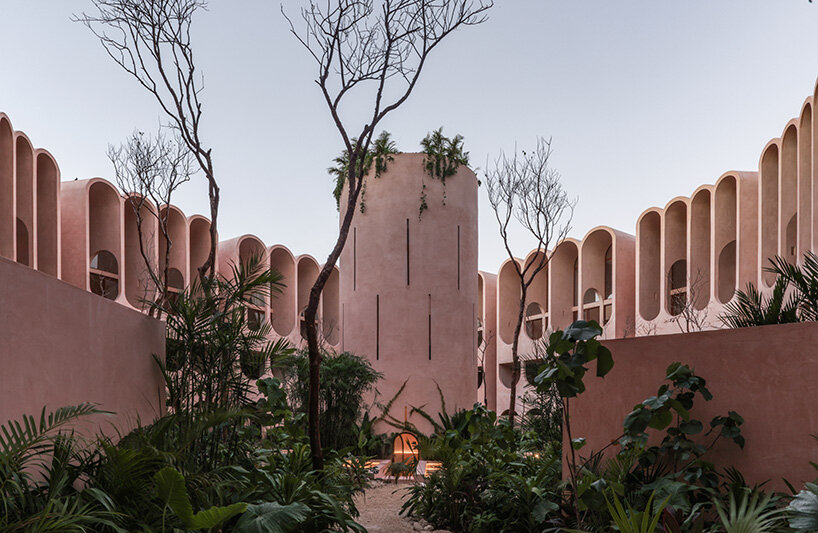 central tower rises from elliptical courtyard in V taller's arched complex in mexico