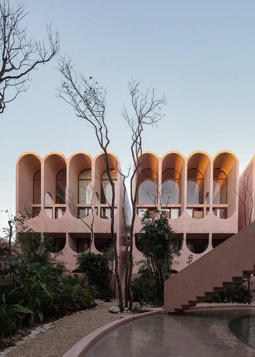 central tower rises from elliptical courtyard in V taller's arched complex in mexico