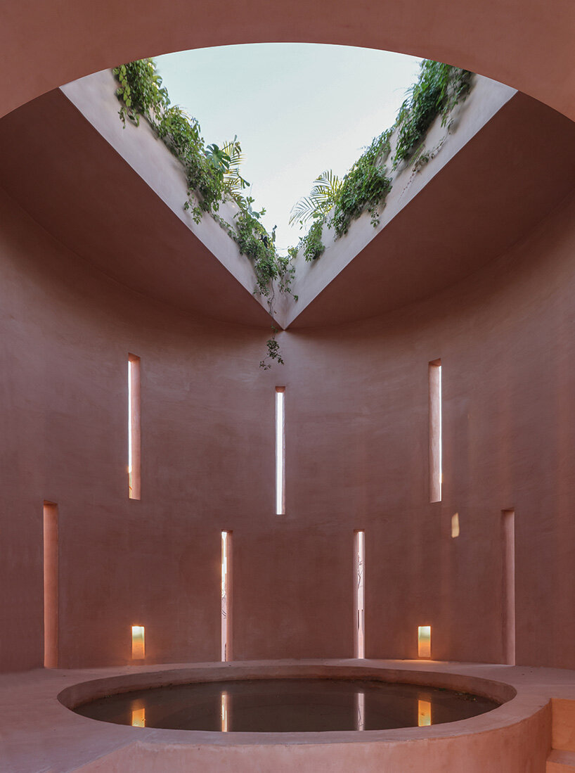 central tower rises from elliptical courtyard in V taller's arched complex in mexico