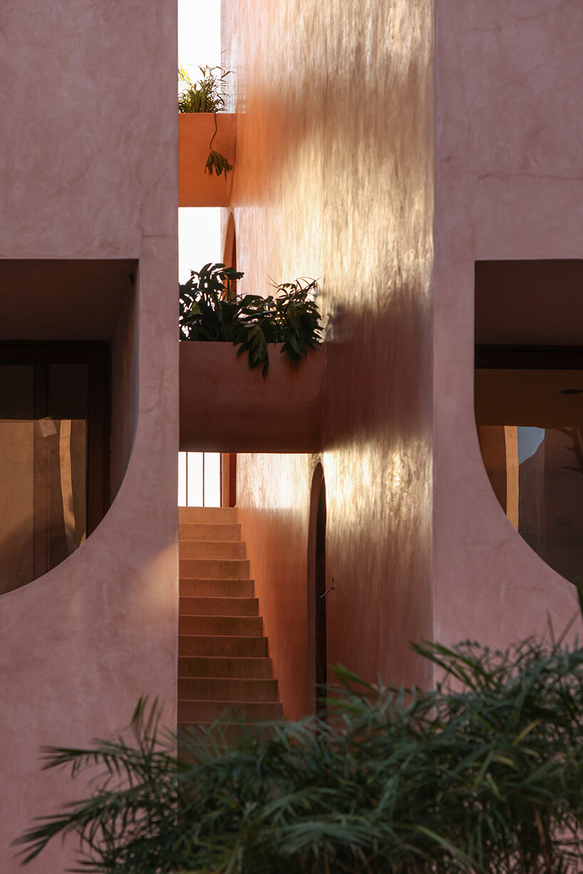 central tower rises from elliptical courtyard in V taller's arched complex in mexico