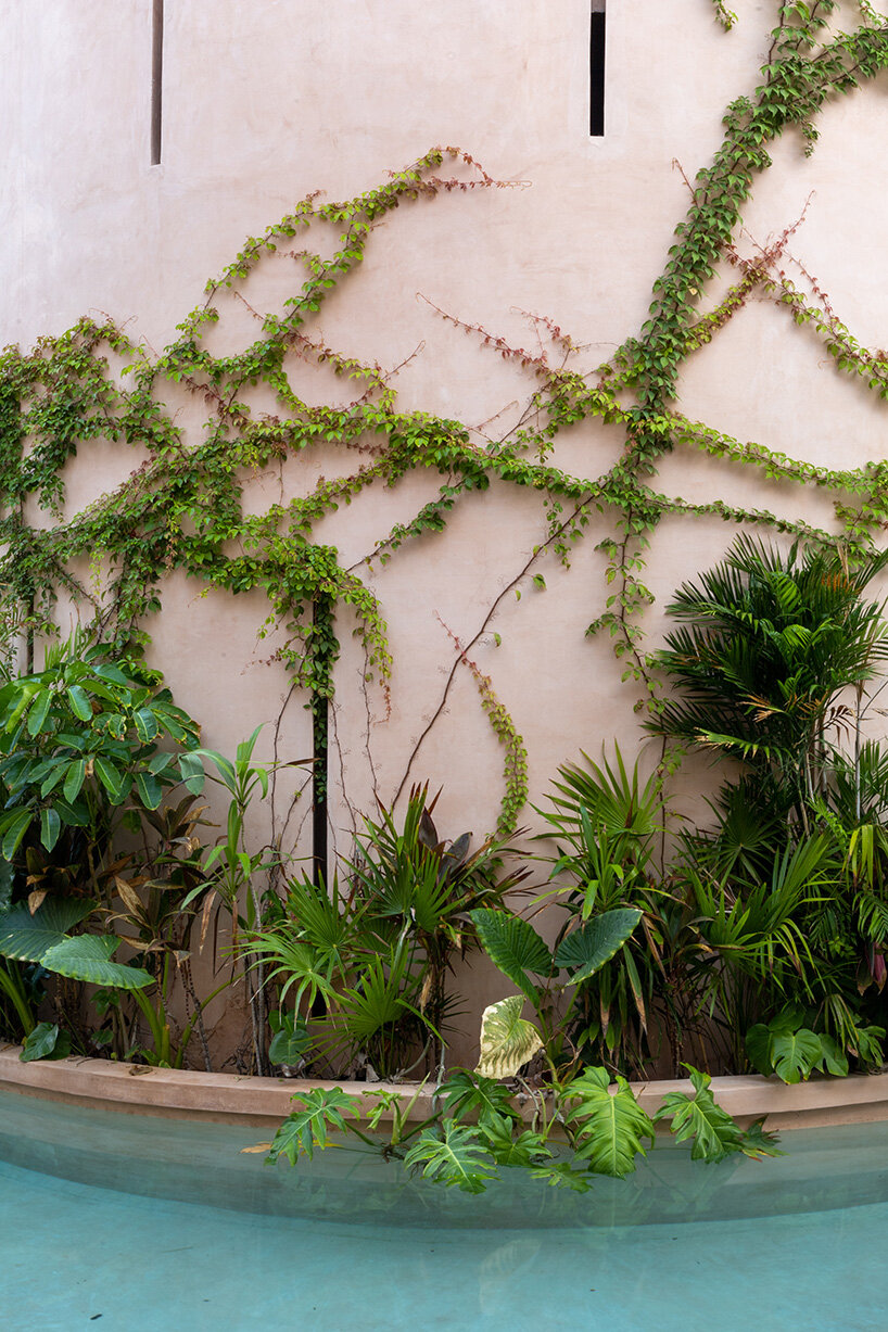 central tower rises from elliptical courtyard in V taller's arched complex in mexico
