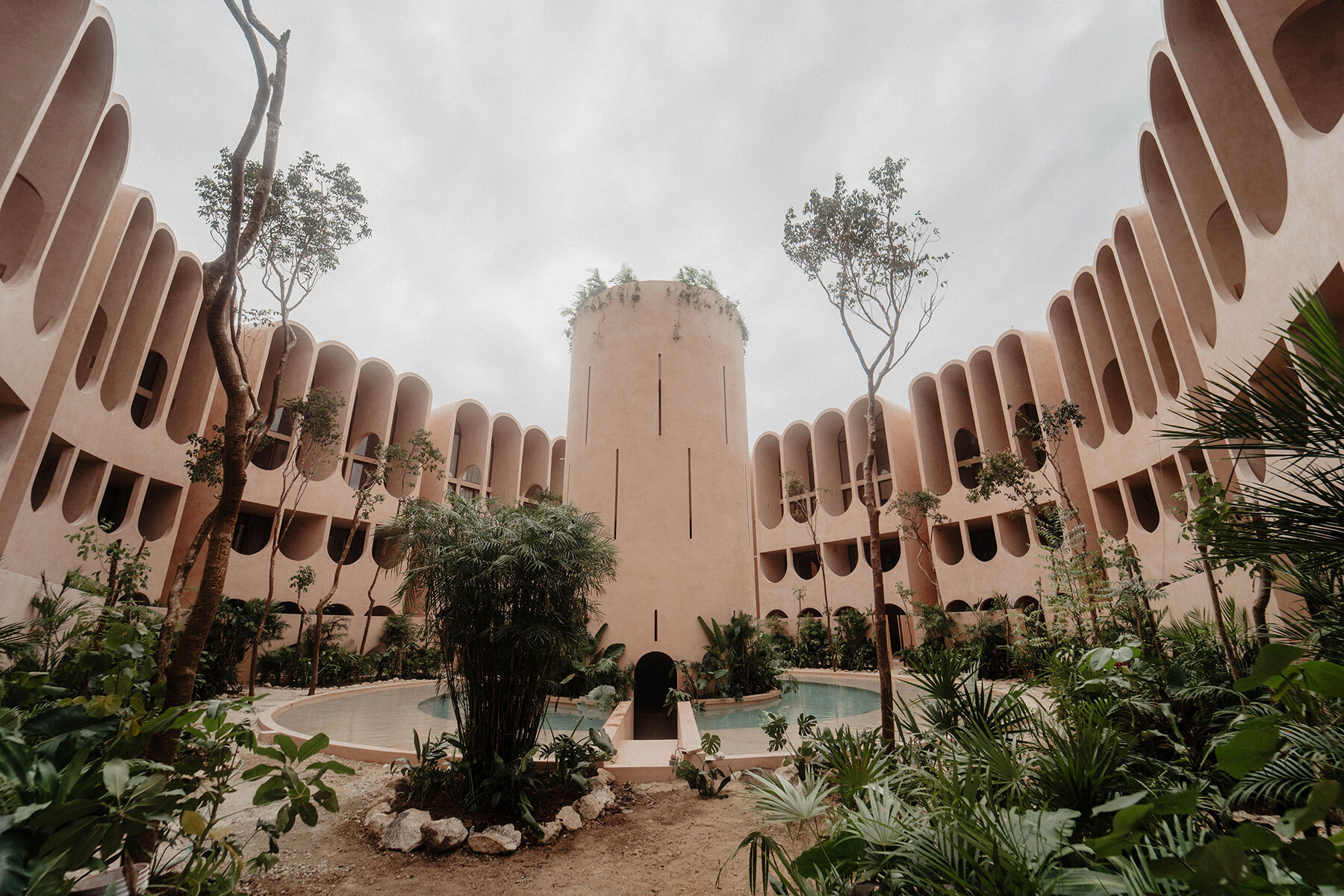 central-tower-elliptical-courtyard-v-taller-babel-arched-complex-mexico-tulum-designboom-large01
