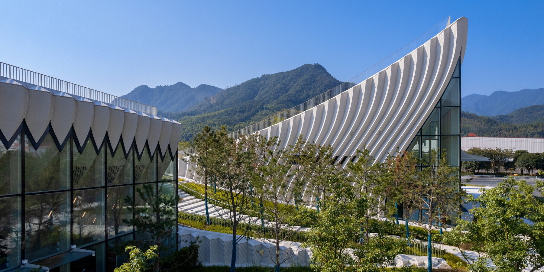 curved-concrete-roofs-atelier-alter-architects-museum-chinese-mountain-foothills-designboom-large02