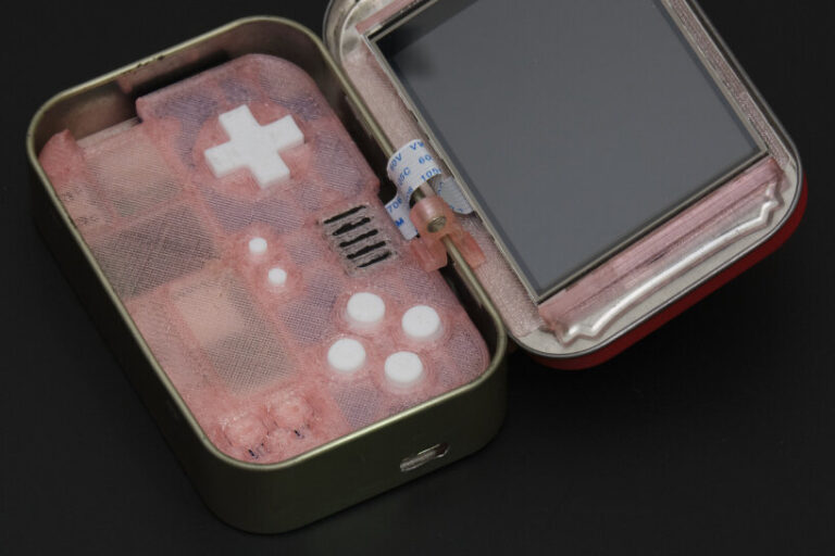 raspberry pi gaming console fits inside recycled altoids mint tin