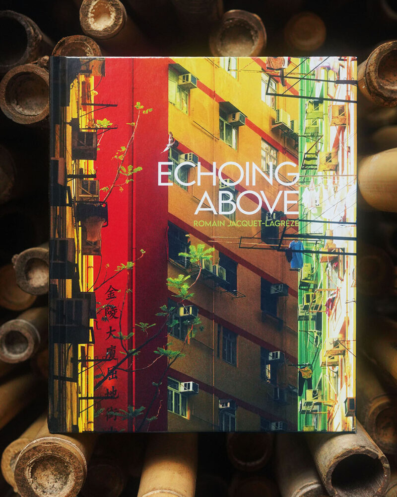 romain jacquet-lagrèze captures bamboo scaffolding workers hovering above hong kong