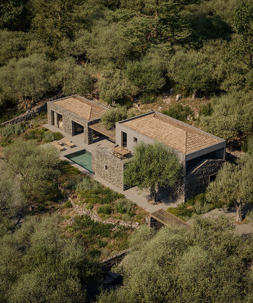 rough stone textures interplay with smooth gray cement for enigma project in paxos island
