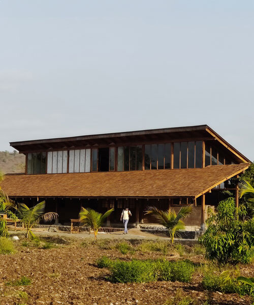 metis practice combines wooden shingles and copper for pali farmhouse's roofing in india