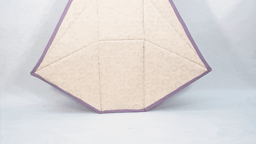 the chair snaps into place using magnets inside the fabric