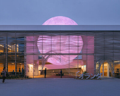 giant luminous sphere emerges from RAU architects' netherlands pavilion at expo 2025 osaka